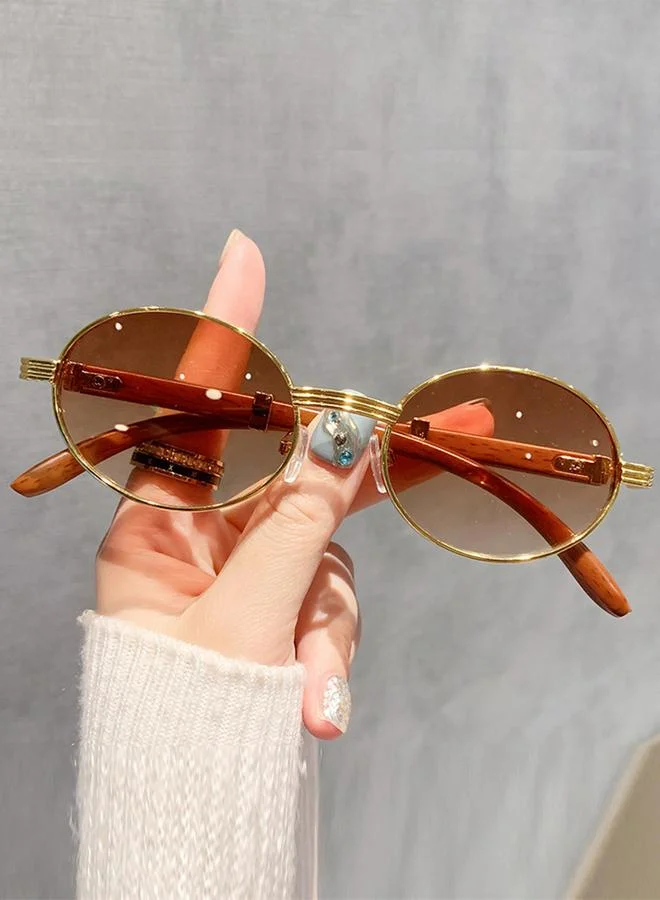 تايك تو نظارة شمسية بيضاوية بإطار ذهبي